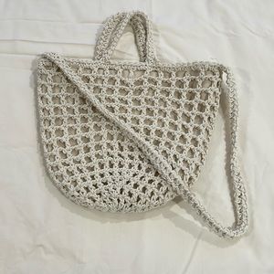 Madewell crochet rope tote bag with cross body strap.